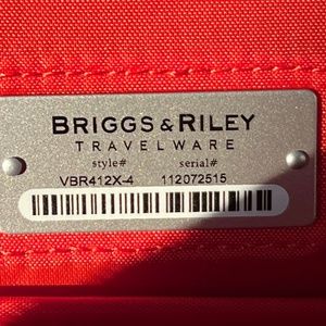 As in Riley travel, carry-on, new